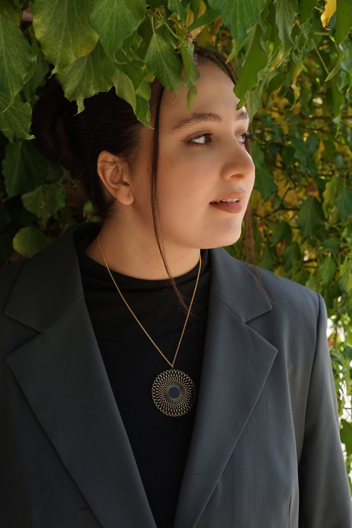 Halskette Sonnenrad Medium | schwarz/gold